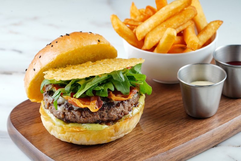 Burger pop-up catering with burgers grilled fresh at an event